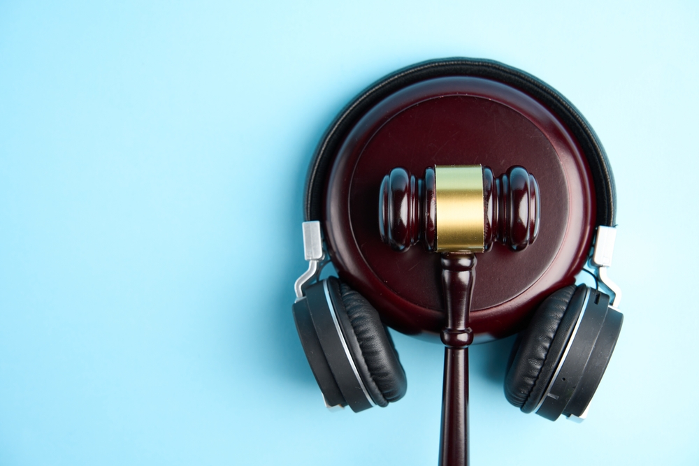 Music_Copyright_Law_Concept_Headphones_And_Judge_Gavel
